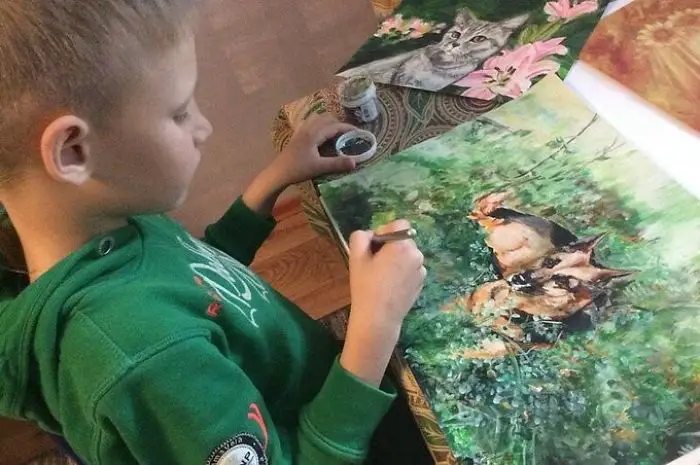 9 year old Russian boy trades his art for abandoned dog food and medicine 5da51714943ec 700
