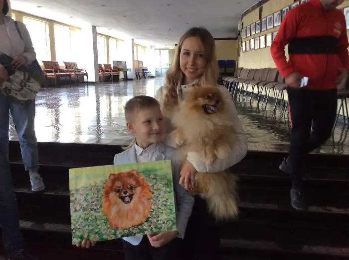 9 year old Russian boy trades his art for abandoned dog food and medicine 5da5173269e0d 700