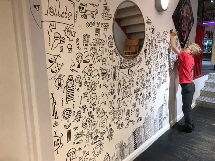 doodle boy decorates restaurant joe whale 7 5dbfd6dd01a6b 700