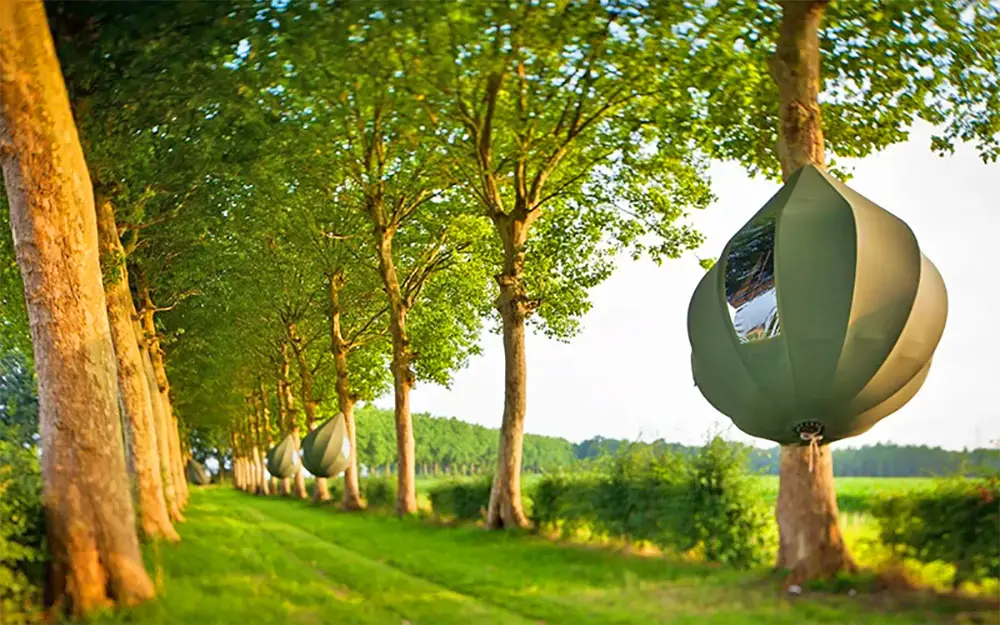 these incredible raindrop shaped tree tents let you sleep in the trees 6755