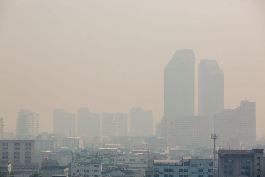 Office building under smog in Bangkok. Smog is a kind of air pollution. Bangkok City in the air pollution.