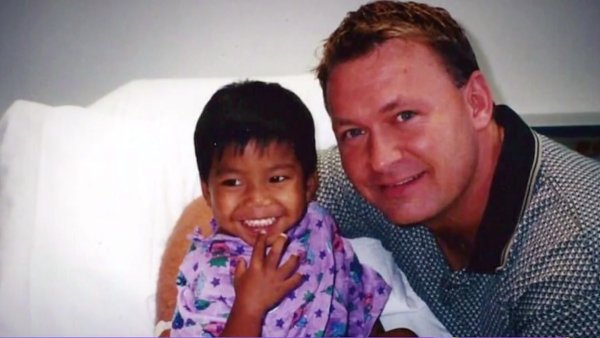 single gay father adopts sick child from cambodia