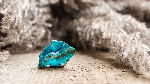 polished chrysocolla gem stone mineral on wood 2022 11 02 00 19 01 utc